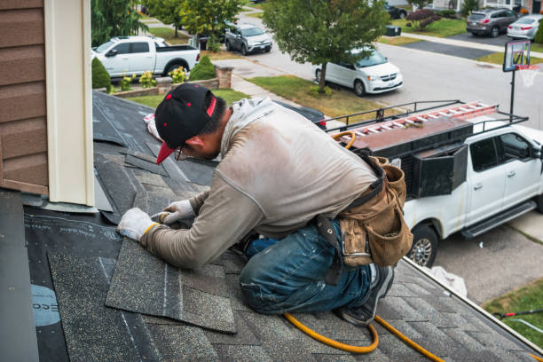 Professional Roofing technician working in Burley, WA